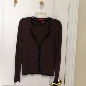 Twin cardigan set in brown with black trim border.